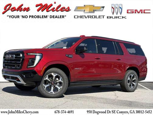 Volcanic Red Tintcoat 2026 GMC Yukon XL 4WD AT4