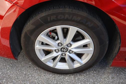 Supersonic Red 2025 Toyota Camry LE