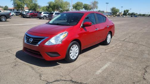 Red Brick 2015 Nissan Versa 1.6 SV