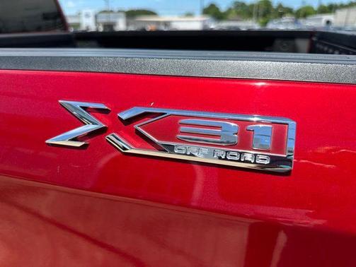Volcanic Red Tintcoat 2023 GMC Sierra 1500 SLT