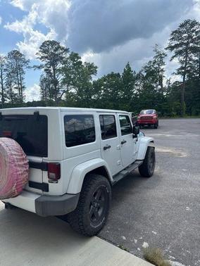 Bright White Clearcoat 2012 Jeep Wrangler Unlimited Altitude