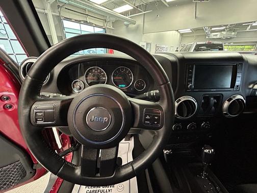 MAROON 2012 Jeep Wrangler Sahara