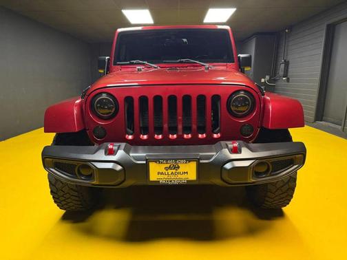 Deep Cherry Red Crystal Pearlcoat 2012 Jeep Wrangler Unlimited Sahara