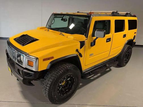 Yellow 2004 Hummer H2 Base