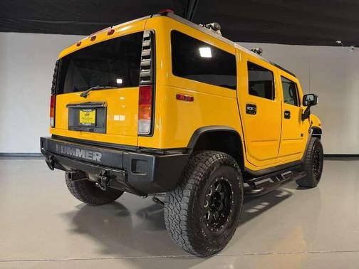 Yellow 2004 Hummer H2 Base
