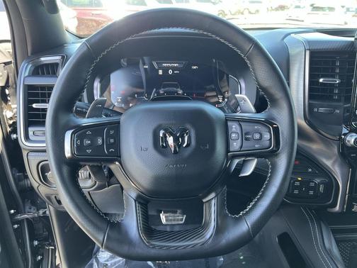 Diamond Black Crystal Pearlcoat 2026 RAM 1500 RHO Crew Cab 4x4 5'7' Box