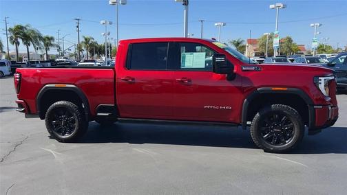 Volcanic Red Tintcoat 2024 GMC Sierra 2500 AT4