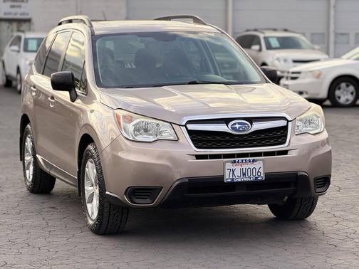 Tan 2015 Subaru Forester 2.5i Premium