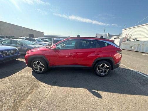Red 2023 Hyundai TUCSON SEL