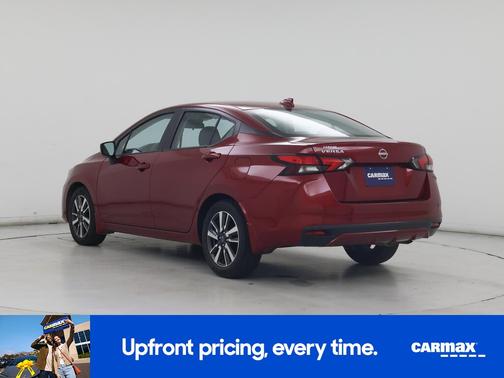 Red 2025 Nissan Versa SV