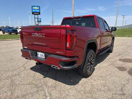 Volcanic Red Tintcoat 2026 GMC Sierra 1500 AT4