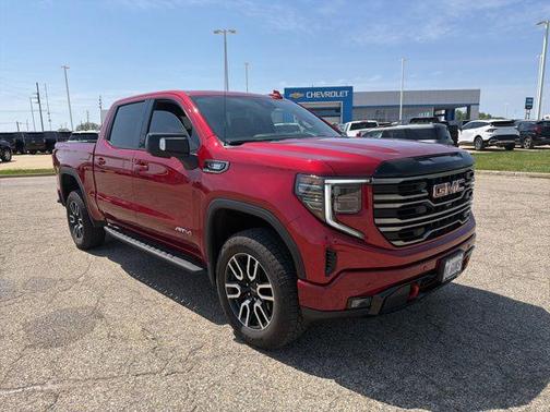 Volcanic Red Tintcoat 2026 GMC Sierra 1500 AT4
