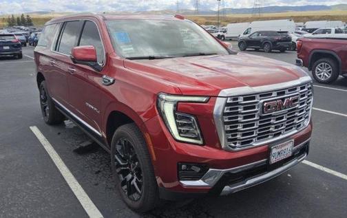 Volcanic Red Tintcoat 2025 GMC Yukon XL Denali