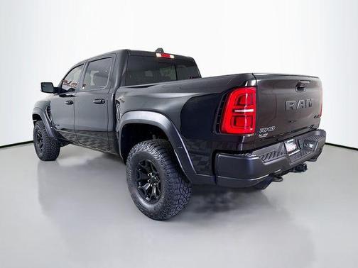 Diamond Black Crystal Pearlcoat 2026 RAM 1500 RHO Crew Cab 4x4 5'7' Box