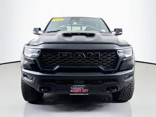 Diamond Black Crystal Pearlcoat 2026 RAM 1500 RHO Crew Cab 4x4 5'7' Box