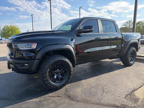 Diamond Black Crystal Pearlcoat 2026 RAM 1500 RHO Crew Cab 4x4 5'7' Box