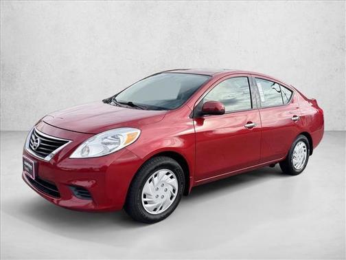 Red Brick 2014 Nissan Versa 1.6 SV