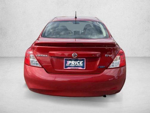 Red Brick 2014 Nissan Versa 1.6 SV