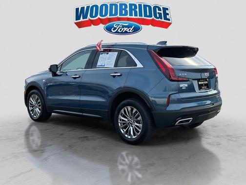 Deep Sea Metallic 2024 Cadillac XT4 Premium Luxury