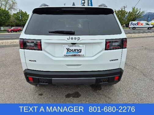 Bright White Clearcoat 2026 Jeep Cherokee Laredo 4x4