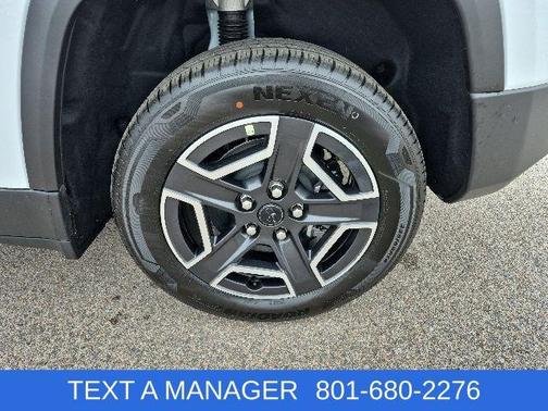 Bright White Clearcoat 2026 Jeep Cherokee Laredo 4x4