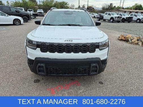 Bright White Clearcoat 2026 Jeep Cherokee Laredo 4x4