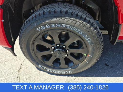 Flame Red Clearcoat 2026 RAM 2500 Laramie Crew Cab 4x4 6'4' Box