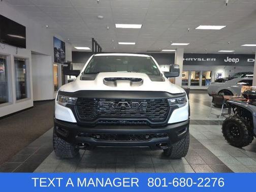 Bright White Clearcoat 2026 RAM 1500 RHO Crew Cab 4x4 5'7' Box