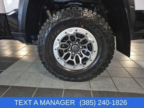 Bright White Clearcoat 2026 RAM 1500 RHO Crew Cab 4x4 5'7' Box