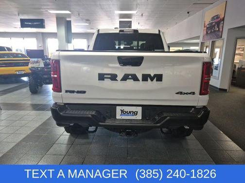 Bright White Clearcoat 2026 RAM 1500 RHO Crew Cab 4x4 5'7' Box