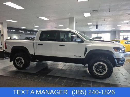 Bright White Clearcoat 2026 RAM 1500 RHO Crew Cab 4x4 5'7' Box