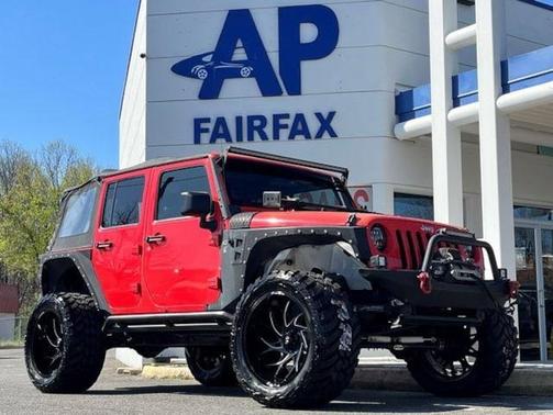 Photo 4 of 34 of 2013 Jeep Wrangler Unlimited Sport