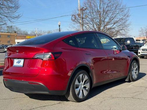 Red 2024 Tesla Model Y Long Range