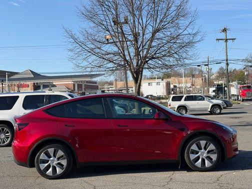 Red 2024 Tesla Model Y Long Range