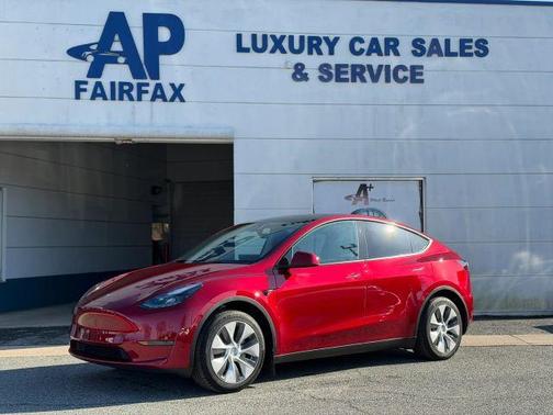 Red 2024 Tesla Model Y Long Range