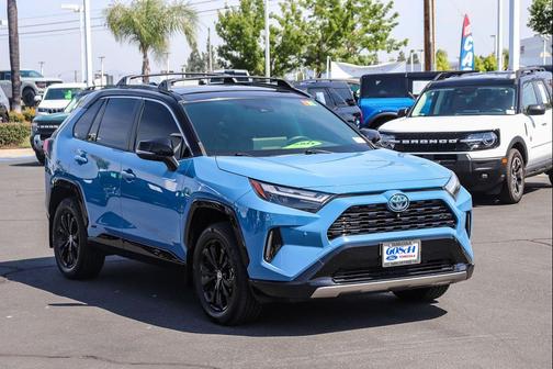 Midnight Black Metallic 2023 Toyota RAV4 Hybrid SE
