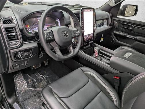 Diamond Black Crystal Pearlcoat 2026 RAM 1500 RHO Crew Cab 4x4 5'7' Box
