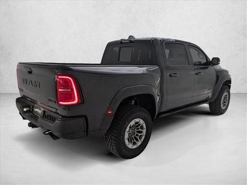 Diamond Black Crystal Pearlcoat 2026 RAM 1500 RHO Crew Cab 4x4 5'7' Box