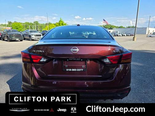 Garnet Pearl Metallic 2024 Nissan Altima 2.5 SV