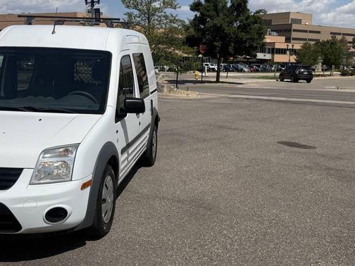 Frozen White 2010 Ford Transit Connect XLT