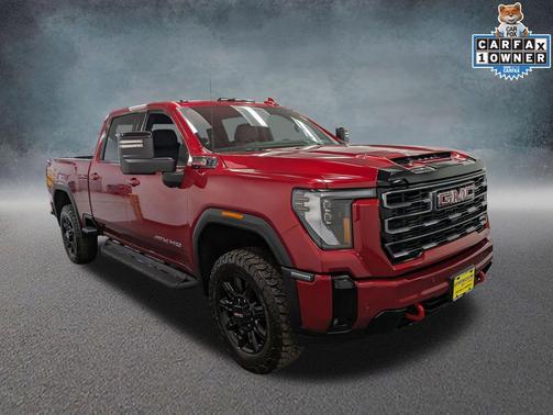 Volcanic Red Tintcoat 2026 GMC Sierra 3500 AT4