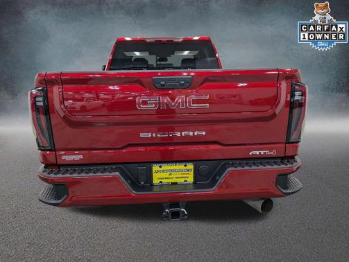 Volcanic Red Tintcoat 2026 GMC Sierra 3500 AT4