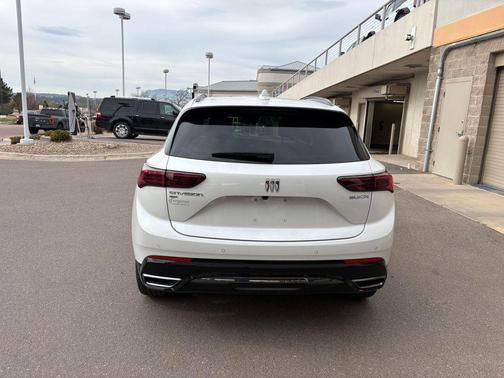 White Frost Tricoat 2025 Buick Envision Sport Touring AWD