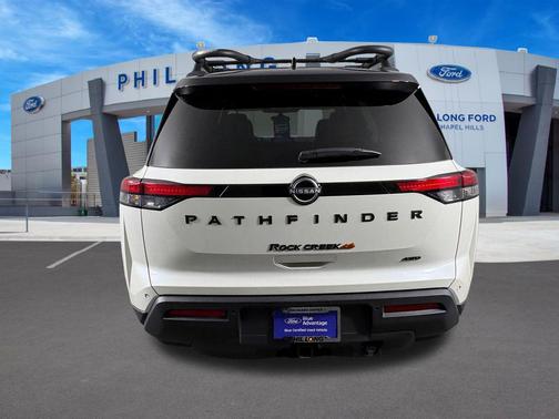 Pearl White Tricoat/Super Black 2024 Nissan Pathfinder Rock Creek 4WD