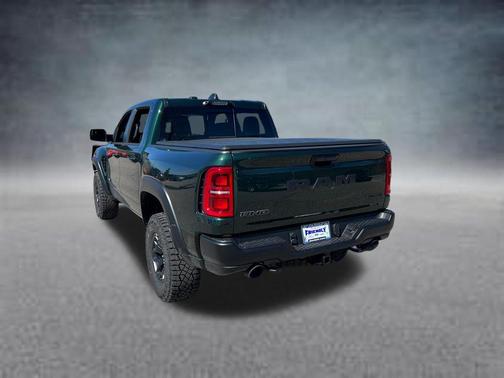 Serrano Green Metallic 2026 RAM 1500 RHO Crew Cab 4x4 5'7' Box