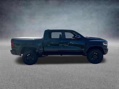 Serrano Green Metallic 2026 RAM 1500 RHO Crew Cab 4x4 5'7' Box
