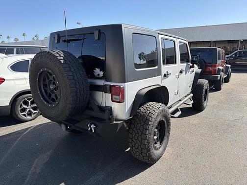 Bright Silver Metallic Clear Coat 2010 Jeep Wrangler Unlimited Sport