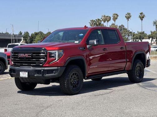 Volcanic Red Tintcoat 2026 GMC Sierra 1500 AT4X