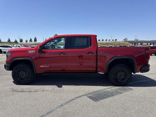 Volcanic Red Tintcoat 2026 GMC Sierra 1500 AT4X