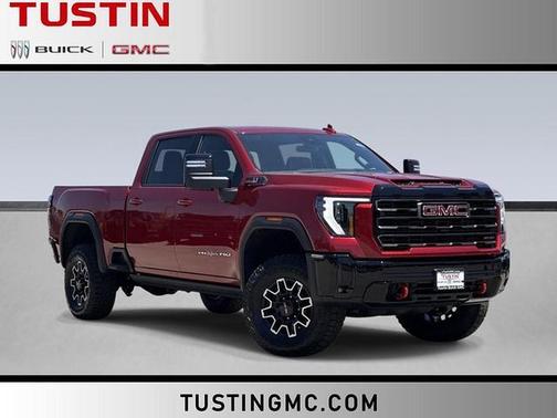 Volcanic Red Tintcoat 2026 GMC Sierra 2500 AT4X